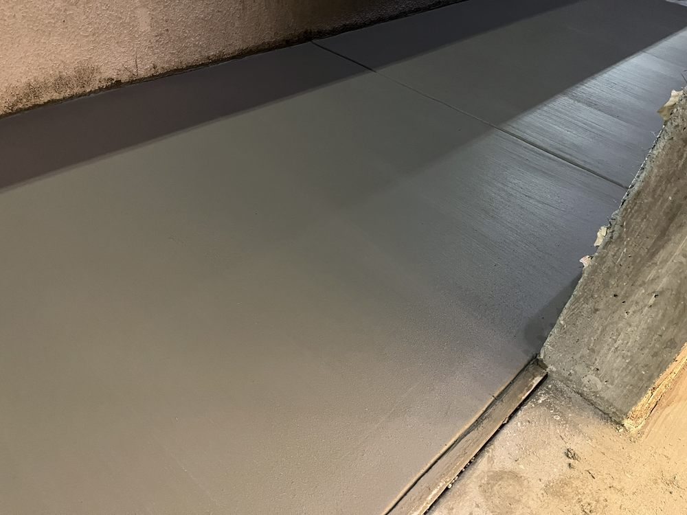 Close detail of a smooth freshly finished concrete surface