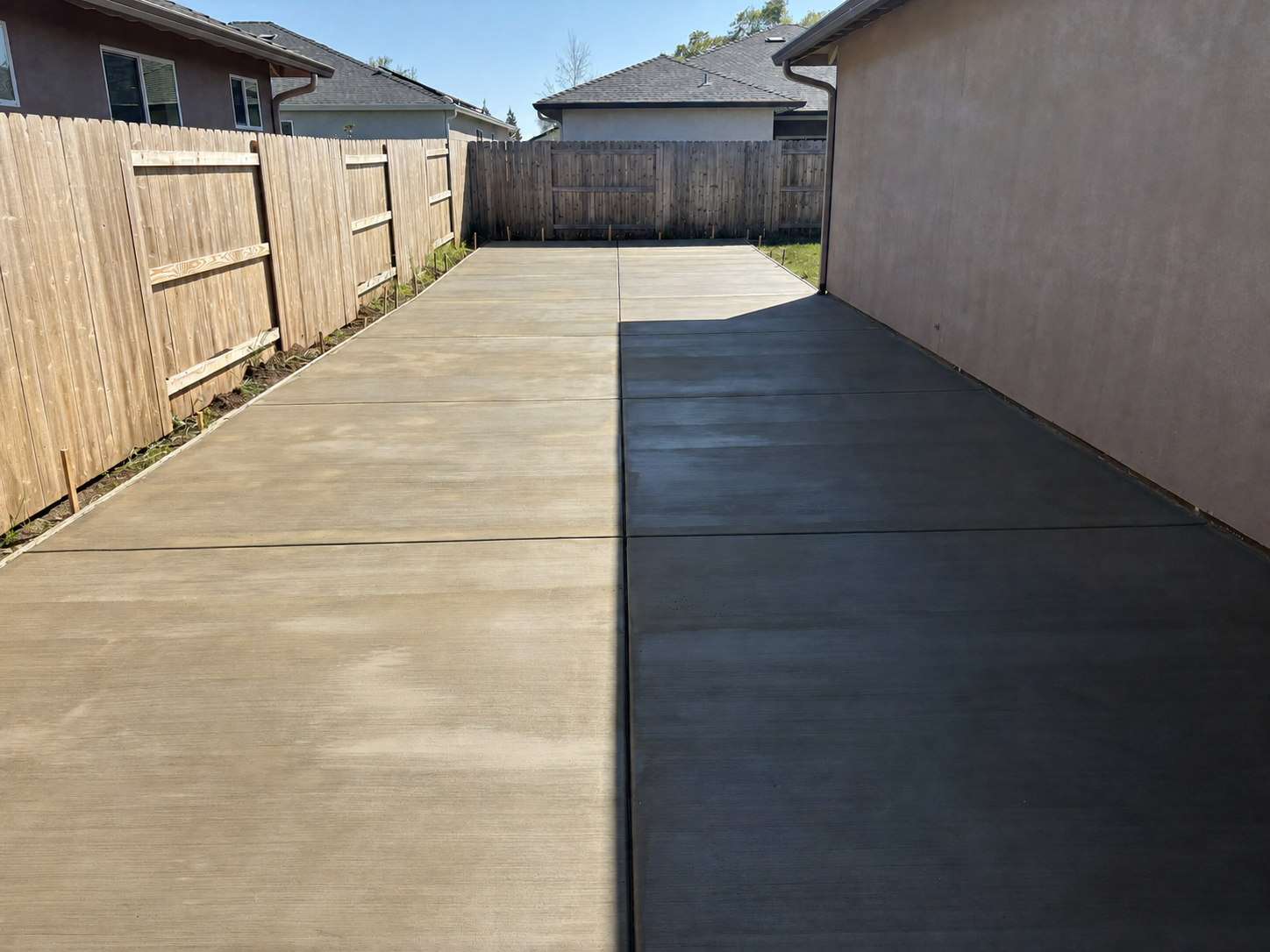 Finished residential concrete flatwork with evenly spaced control joints